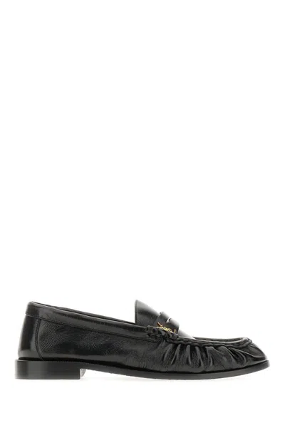 Saint Laurent Leather Fringed Loafers With Metal Studs In Black