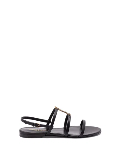 SAINT LAURENT `NEW CASSANDRA` FLAT SANDALS