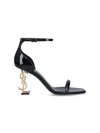 Saint Laurent Opyum Patent Leather Sandals With Structured Heel Featuring Metal Ysl Initials And Adj In Black