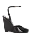 Saint Laurent La Scandale 110 Patent Leather Wedge Sandals In Nero