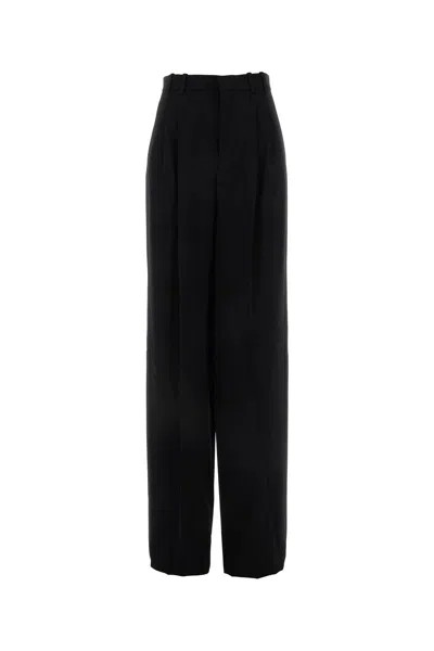 SAINT LAURENT PANTALONE DALLA GAMBA AMPIA IN LANA NERA DONNA