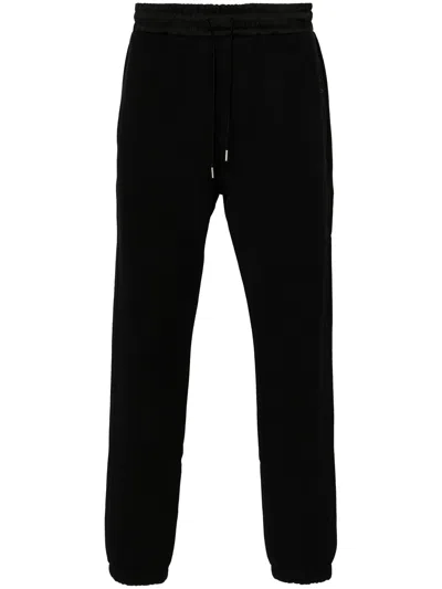 Saint Laurent Pantaloni Stile Tuta In Tessuto Garzato In Black