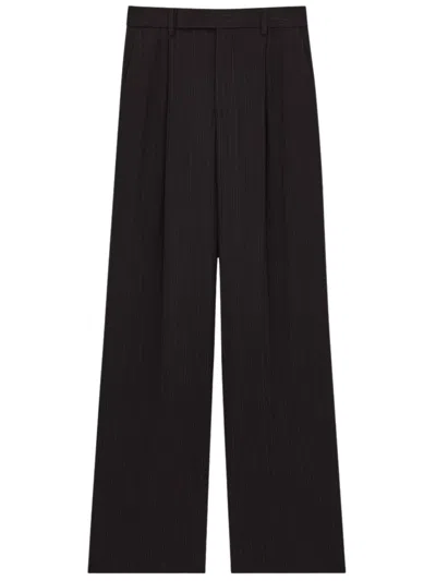 Saint Laurent Pleated Wide-leg Trousers In Black