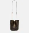 Saint Laurent Pochon Cassandre Leather Bucket Bag In Brown