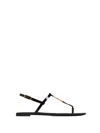 Saint Laurent Cassandra Flat Sandals In Patent Leather, Black With Gold Monogram, Deco In Black