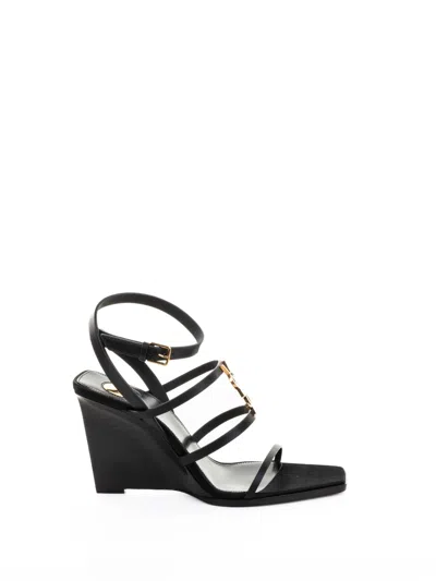 Saint Laurent Black Wedges With Metallic Cassandre Detail And Adjustable Leather Strap In Leather Women