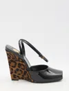 Saint Laurent Le Scandale 110 Patent Leather Wedge Sandals In Black