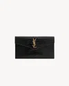 Saint Laurent Shiny Leather Pouch In Black