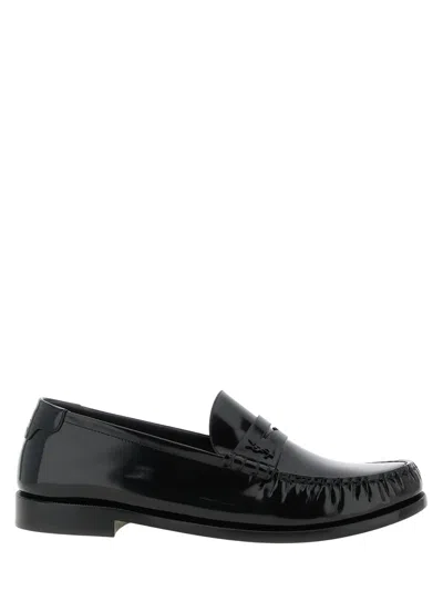 Saint Laurent Sleek Leather Flat Shoes For Men In Black