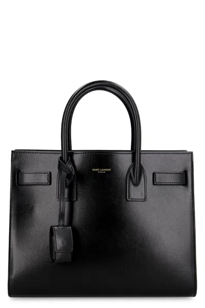 Saint Laurent Smooth Black Leather Mini Tote Handbag With Removable Shoulder Strap And Metal Hardware