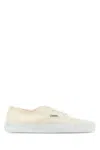 Saint Laurent Logo Print Low Top Sneakers In Beige