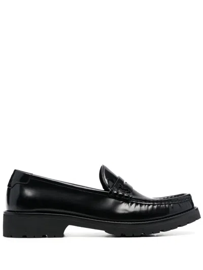 Saint Laurent Sophisticated Men's High-shine Loafers In Black
