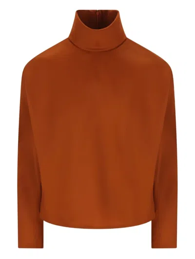 Saint Laurent Structured Shoulder Turtleneck Sweater With High Neck Design In Orange
