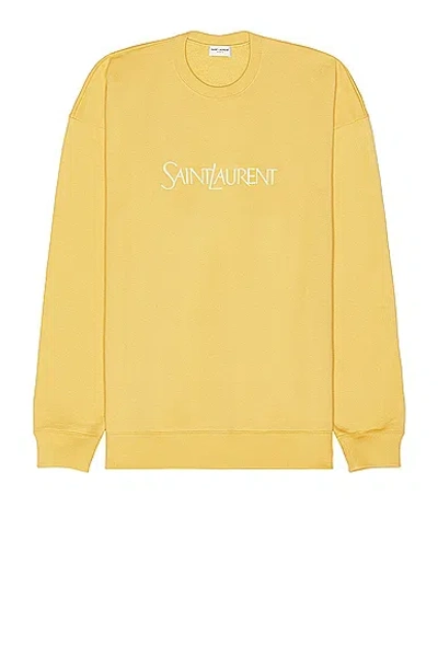 Saint Laurent Logo-print Cotton Sweatshirt In Yellow