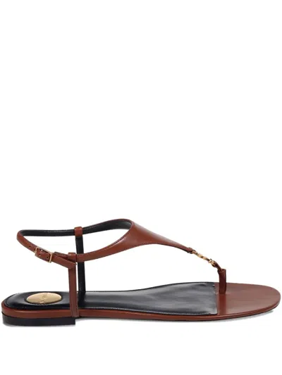 Saint Laurent T-strap Logo-embellished Leather Sandals In Brown