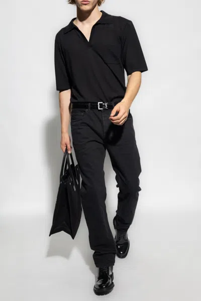 Saint Laurent Tapered Leg Jeans In Black