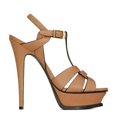 SAINT LAURENT TRIBUTE PLATFORM SANDALS IN VEGETABLE-TANNED LEATHER
