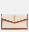Saint Laurent Uptown Canvas Clutch In Beige