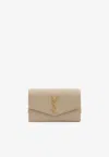 Saint Laurent Uptown Grain De Poudre Leather Chain Clutch In Sand