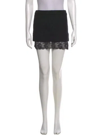Pre-owned Saint Laurent Virgin Wool Mini Skirt In Black