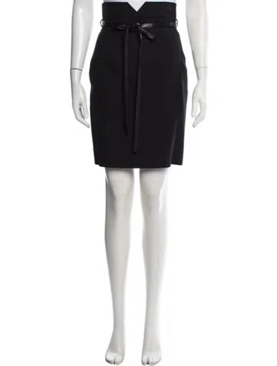 Pre-owned Saint Laurent Virgin Wool Mini Skirt In Black