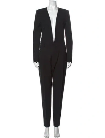 Pre-owned Saint Laurent Virgin Wool Plunge Neckline Jumpsuit In Black