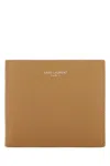 Saint Laurent Textured Leather Bi-fold Wallet In Brown