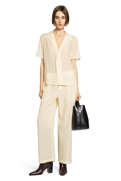 Saint Laurent Woman Beige Jumpsuits In Neutral