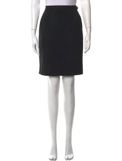 Pre-owned Saint Laurent Wool Mini Skirt In Black