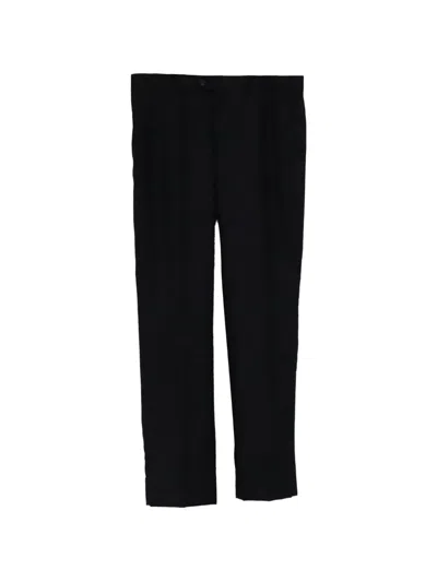 Pre-owned Saint Laurent Wool Trousers In Black