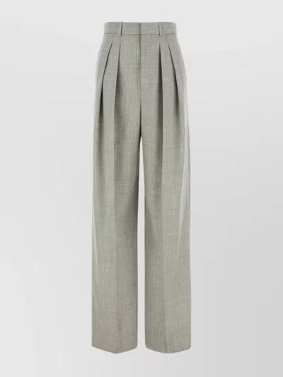 SAINT LAURENT WOOL TROUSERS WITH WIDE LEG AND PLEATED FRONT