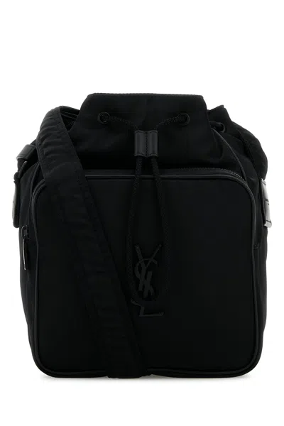 Saint Laurent Logo Plaque Drawstring Shoulder Bag In Black