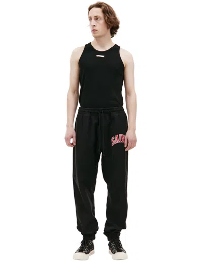 Saint Michael Logo Printed Sweatpants In Black