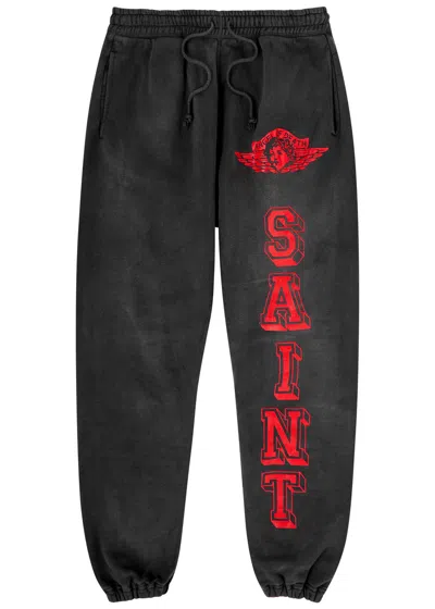 Saint Mxxxxxx Angel Of Death Tapered Logo-print Cotton-jersey Sweatpants In Black