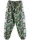 Saint Mxxxxxx Camouflage-print Track Pants In Grün