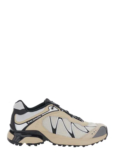 Salomon Unisex Tech Fabric Drawstring Sneaker With Side Logo And Chunky Rubber Sole In Black