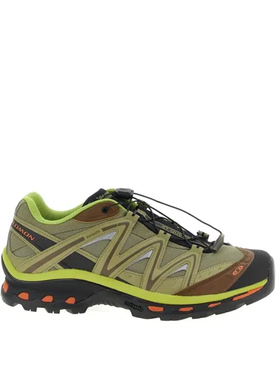 Salomon Rounded Toe Sneakers With Logo-printed Mesh In Green