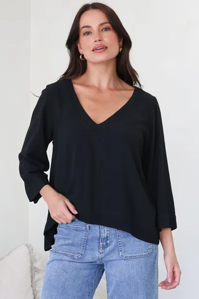 Salty Crush Breezer Top - Long Sleeve V Neck Pull Over Top With High Low Hemline In Black