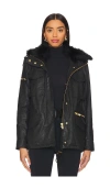 Sam Kate Shearling Trimmed Parka In Black