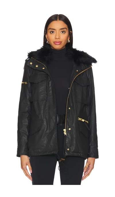 Sam Kate Shearling Trimmed Parka In Black