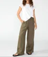 SANCTUARY SMOCKED WIDE LEG LINEN PANTS IN MOSSY GREEN