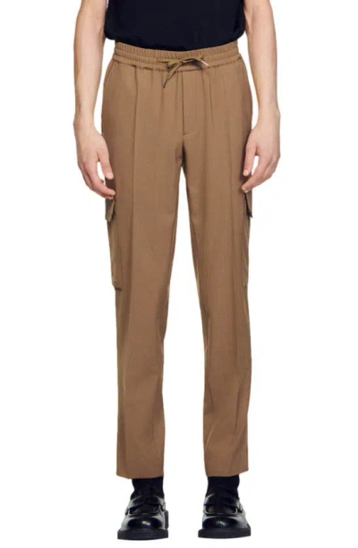 Sandro Alpha Cargo Trousers In Brown