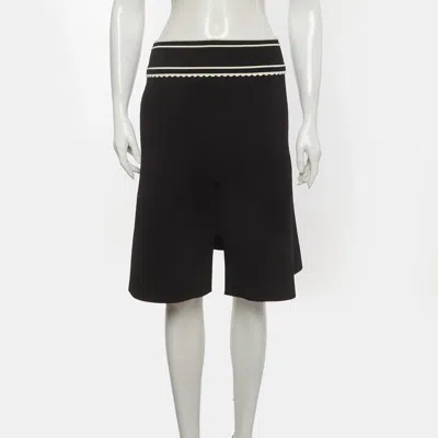 Sandro Black Stretch Knit Flared Mini Skirt In Blue