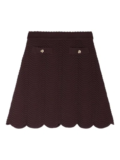 Sandro Button-detail Scallop-hem Knitted Skirt In Purple