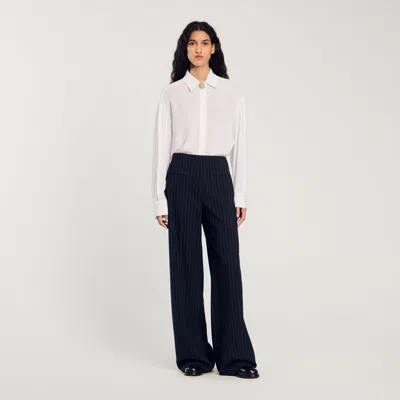 Sandro Chalk-striped Trousers In Black