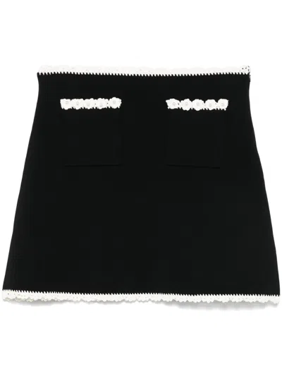 Sandro Contrasting-trim Mini Skirt In Black