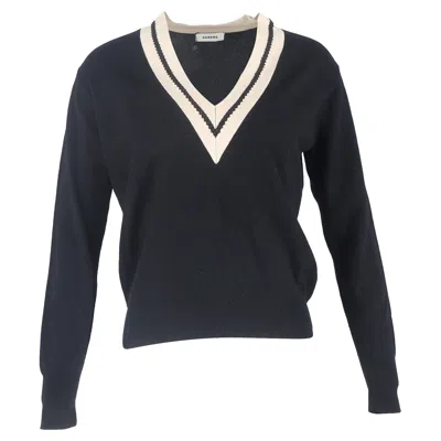 Sandro Contrasting V-neck Knitted Sweater In Black Wool