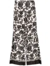 Sandro Crinkled Trousers In Neutrals