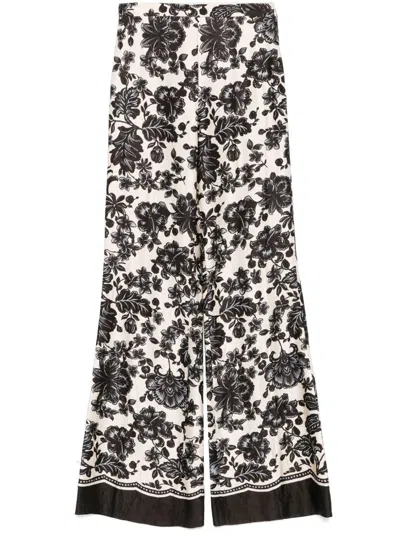 Sandro Crinkled Trousers In Neutrals