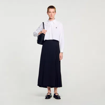 Sandro Curb Chain Buckle Pleated Skirt In Black